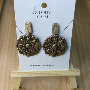 Gold mandala design earrings