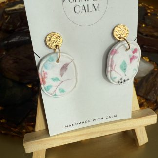 Oval with small floral details dangle Earrings
