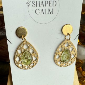 Green stone framed in gold teardrop dangle earrings