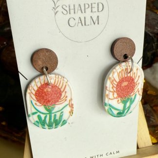 Native print in oval dangle earrings