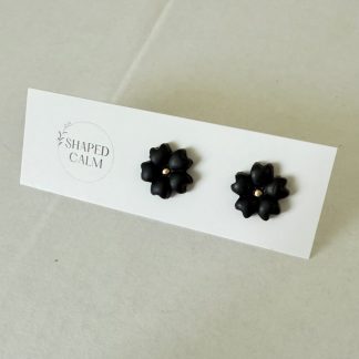 Black floral stud earring